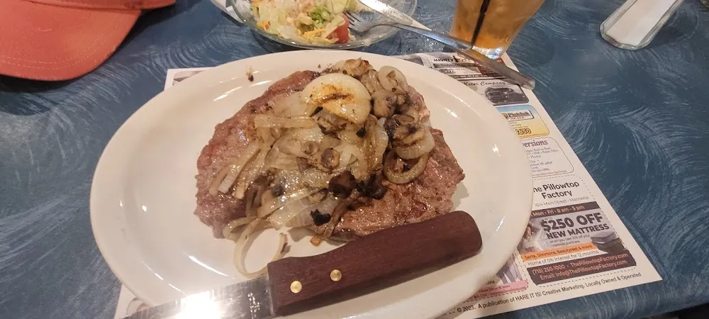 Porterhouse Steak w Grilled Onions & Ushrm